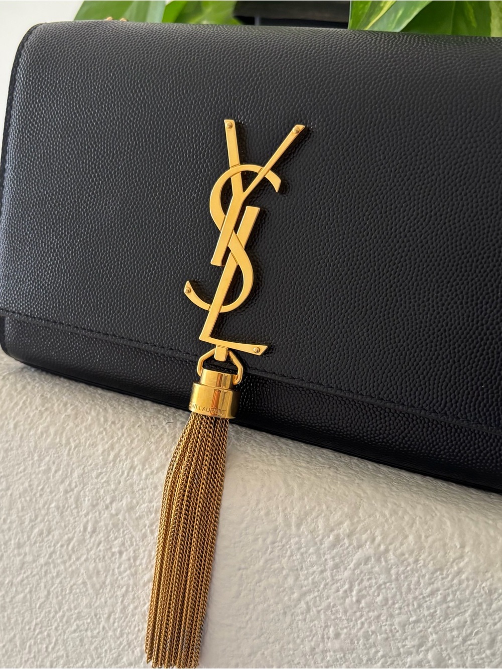 Saint Laurent Black Leather Clutch with Gold YSL Tassel